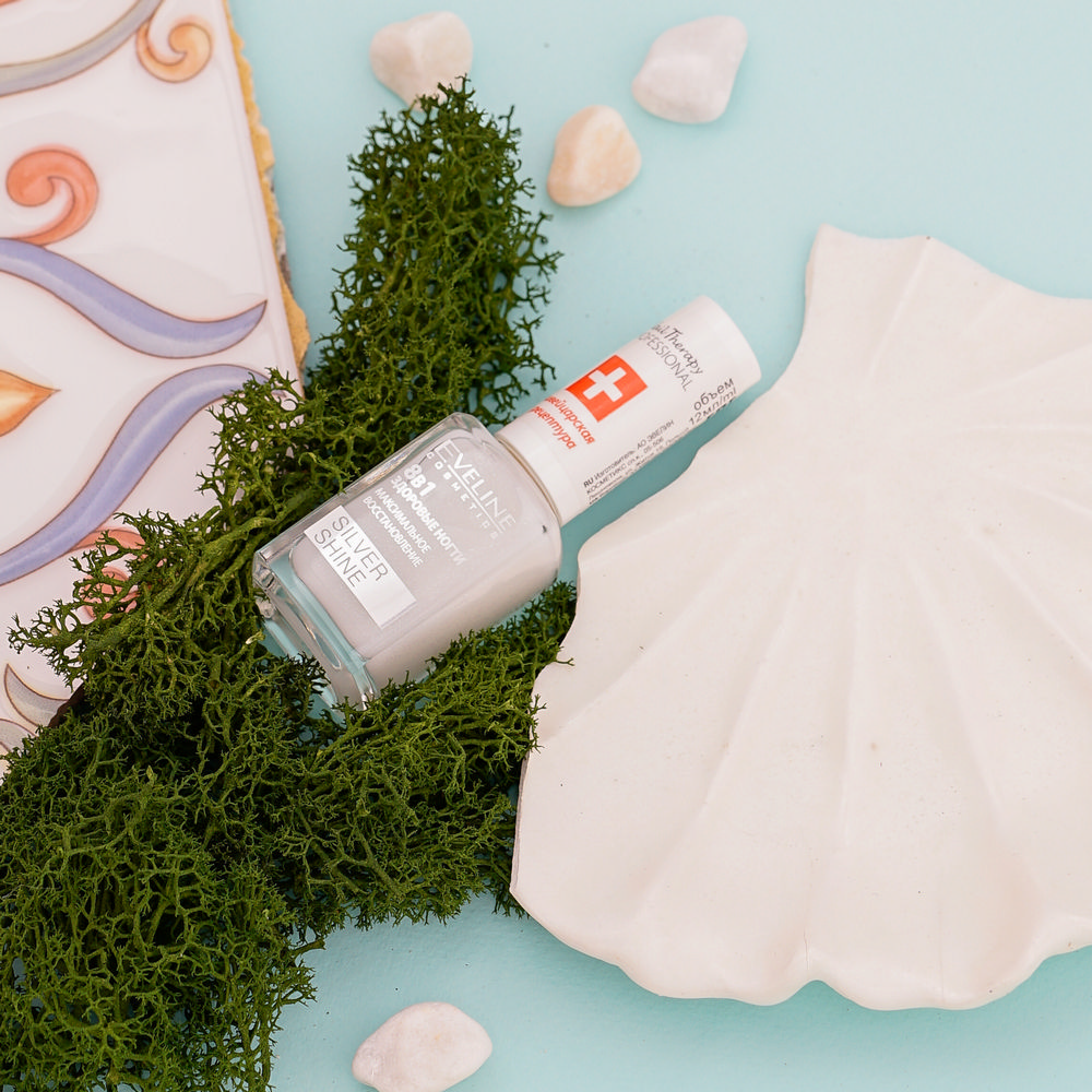 средство Eveline Nail Therapy Professional " Silver Shine " 8 в 1 для ногтей , восстанавливающее 12мл